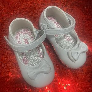 White pretty little shoes